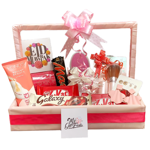 Eid gift basket for her - having chocolates, jewelry and accessories, skin care products, and a Eid card