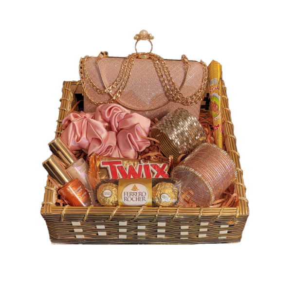 Eid gift basket for women containing, bangles, nail polish, a ladies hand bag, some chocolates, and exciting Eid accessories.